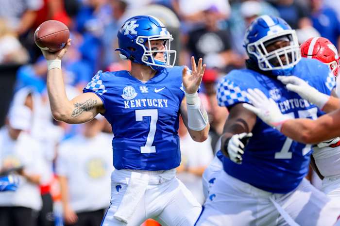 Kentucky QB Will Levis winds up to throw a pass.